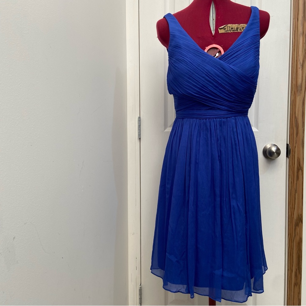 J.Crew women royal blue 100% silk, lined sleeves less midi dress. Size 6. Used.